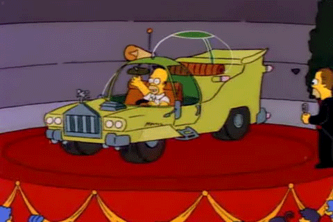 homer simpson spinning uncontrollably in a car
