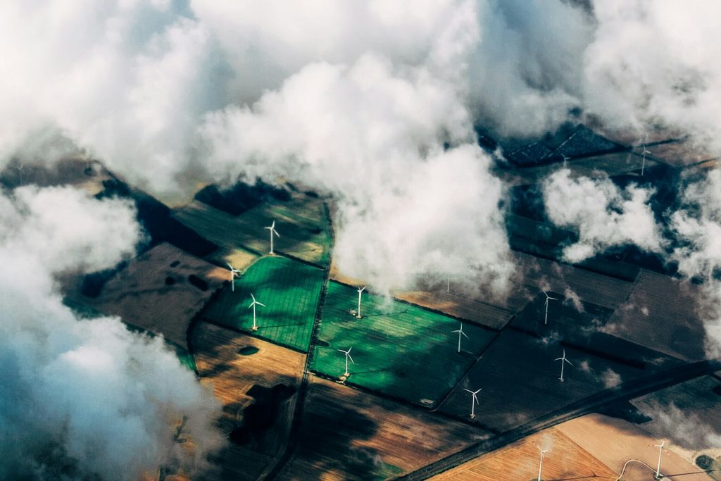 fields with wind turbines taken from the the skies